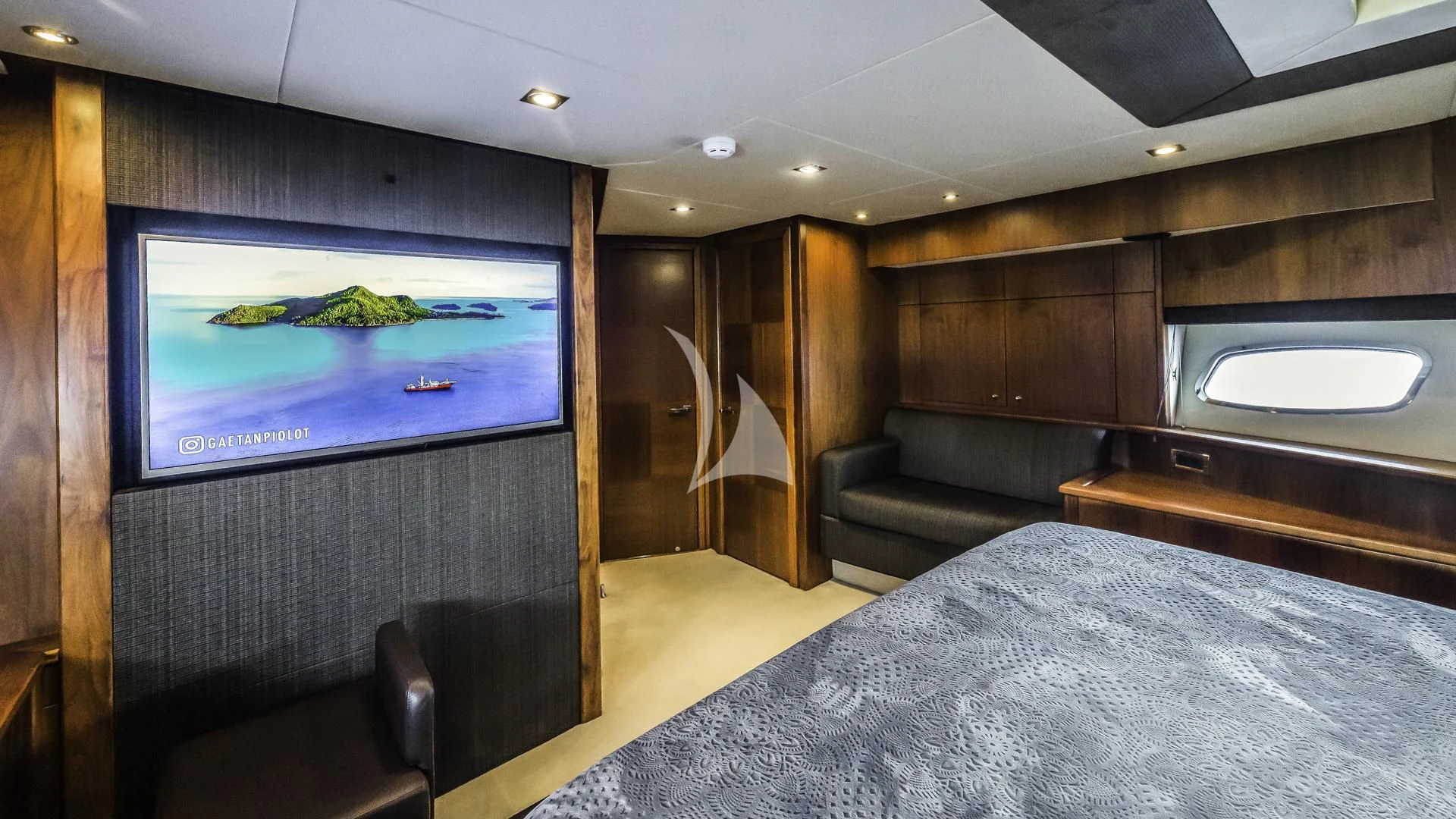 a large television screen in a room aboard THE BEST WAY Yacht for Sale