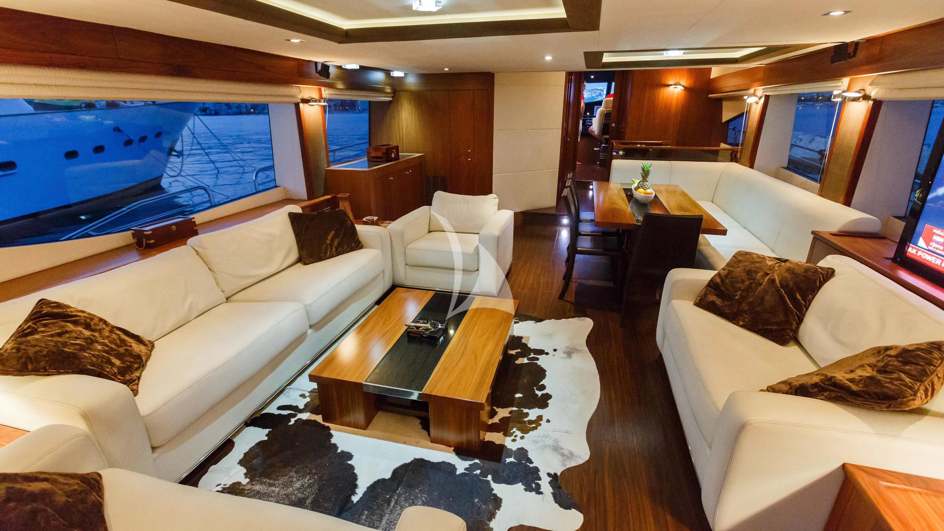 a living room with a large screen aboard THE BEST WAY Yacht for Sale