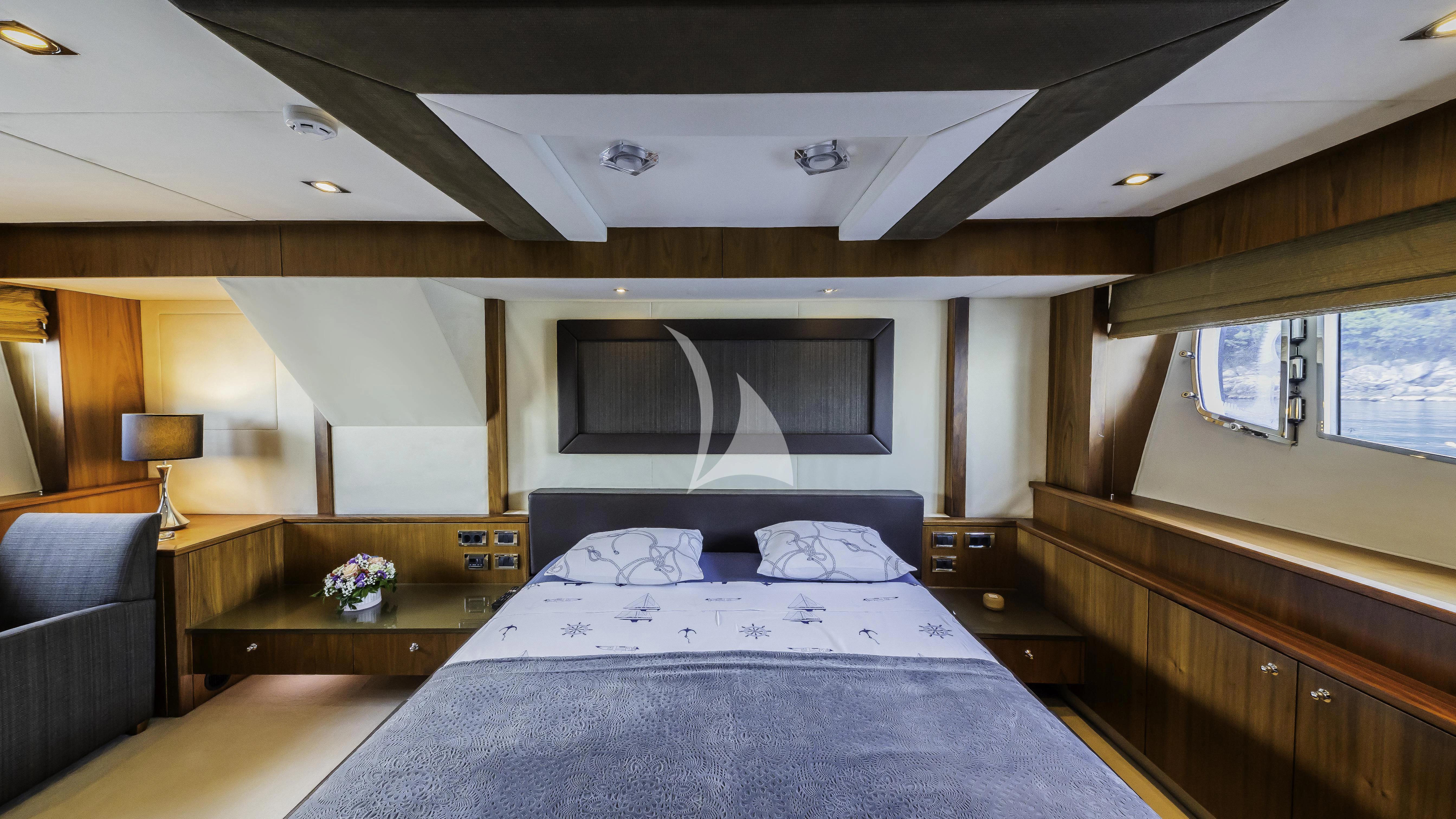 a bedroom with a large bed aboard THE BEST WAY Yacht for Sale