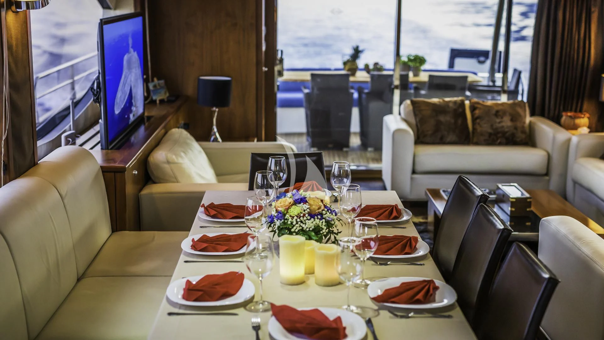 a table with plates and food on it aboard THE BEST WAY Yacht for Sale