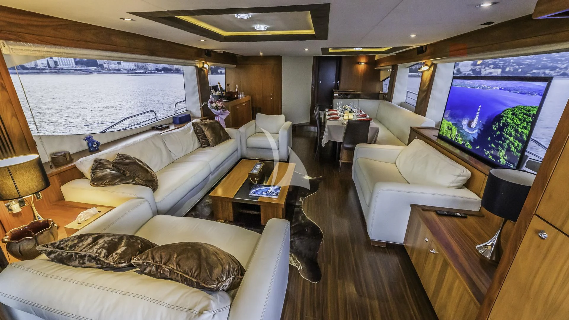 a living room with a large screen aboard THE BEST WAY Yacht for Sale