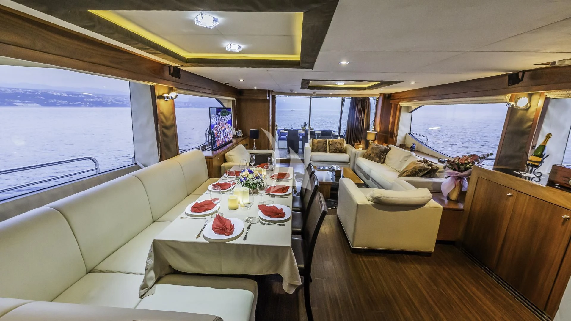 a room with a table and chairs aboard THE BEST WAY Yacht for Sale