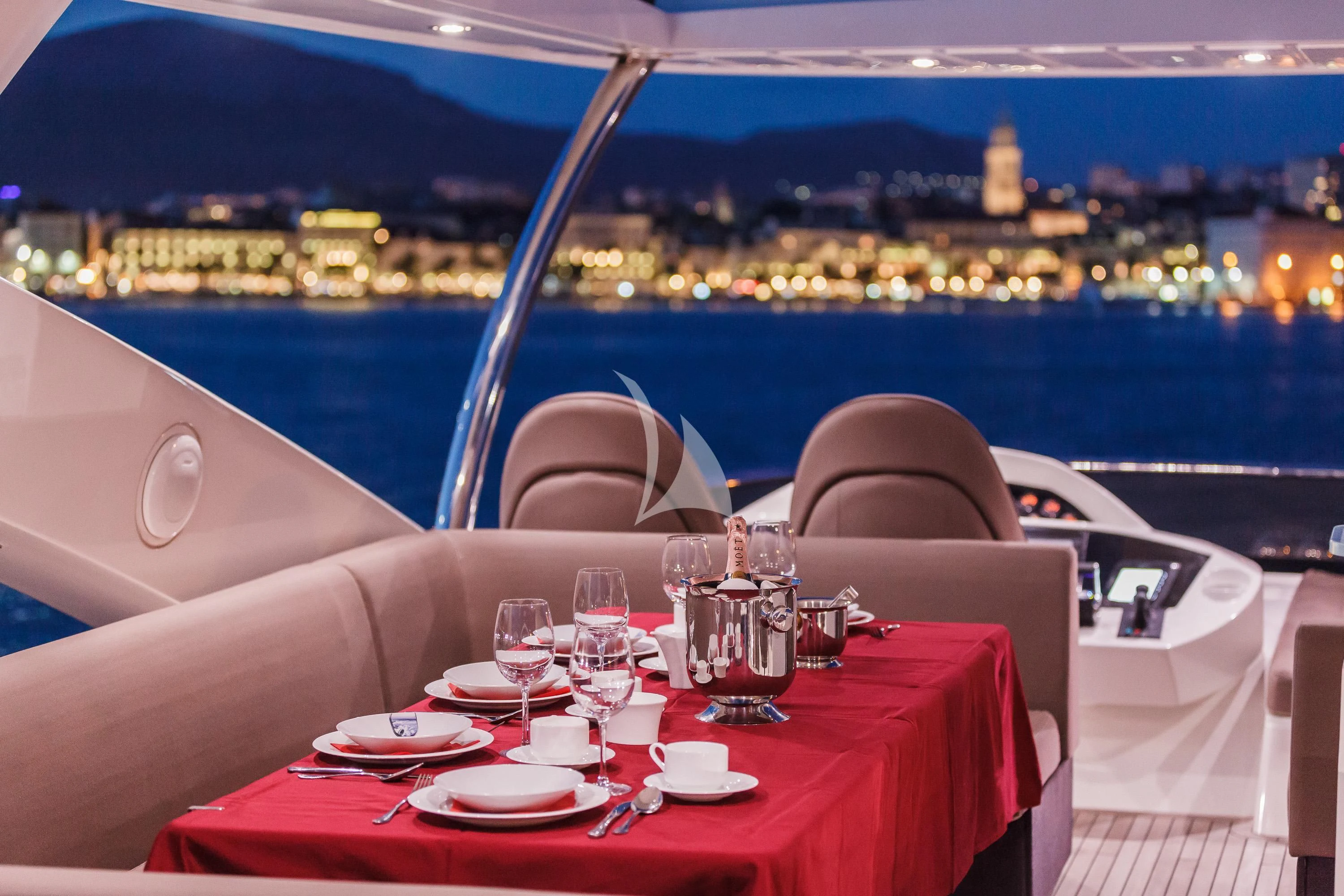 a table set for a dinner on a boat aboard THE BEST WAY Yacht for Sale