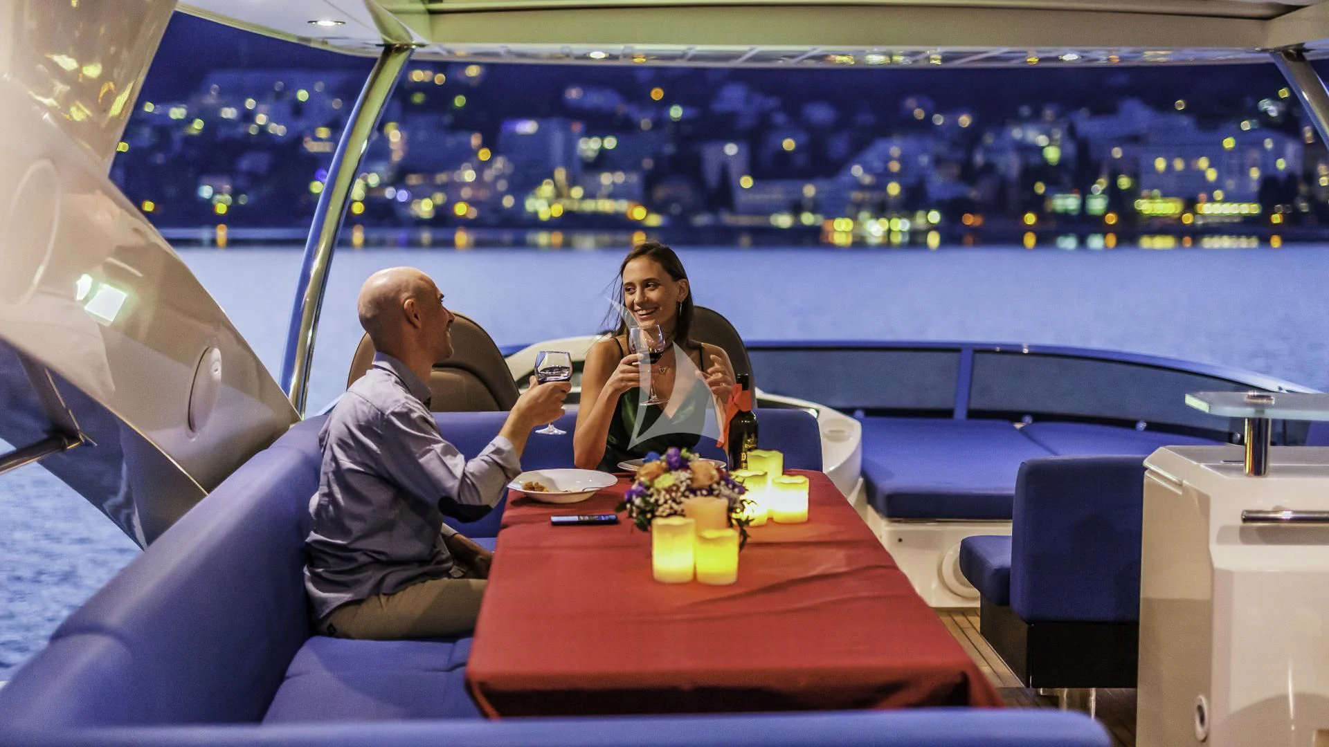 a couple sitting at a table on a boat aboard THE BEST WAY Yacht for Sale