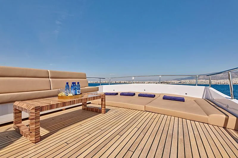 a deck overlooking a body of water aboard WIDE LIBERTY Yacht for Sale