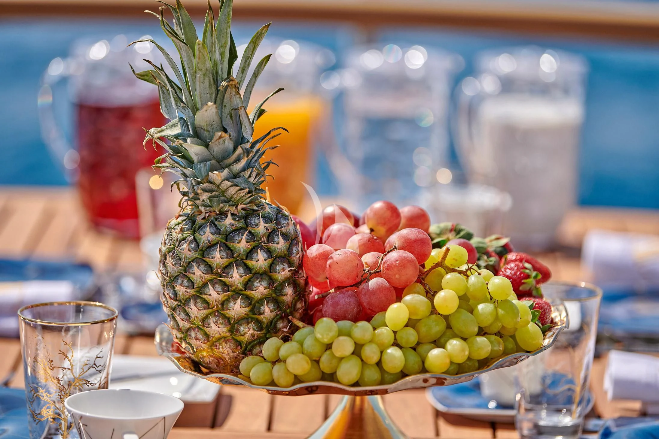 a pineapple on a table aboard WIDE LIBERTY Yacht for Sale