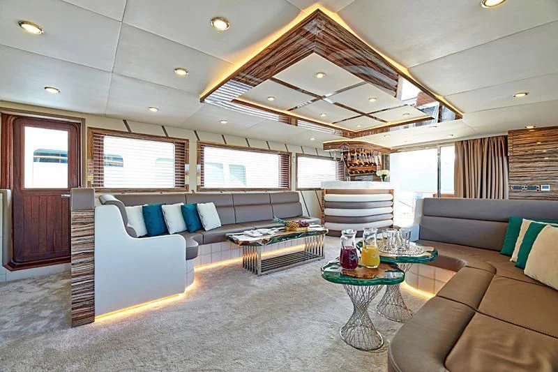 a living room with a large ceiling aboard WIDE LIBERTY Yacht for Sale