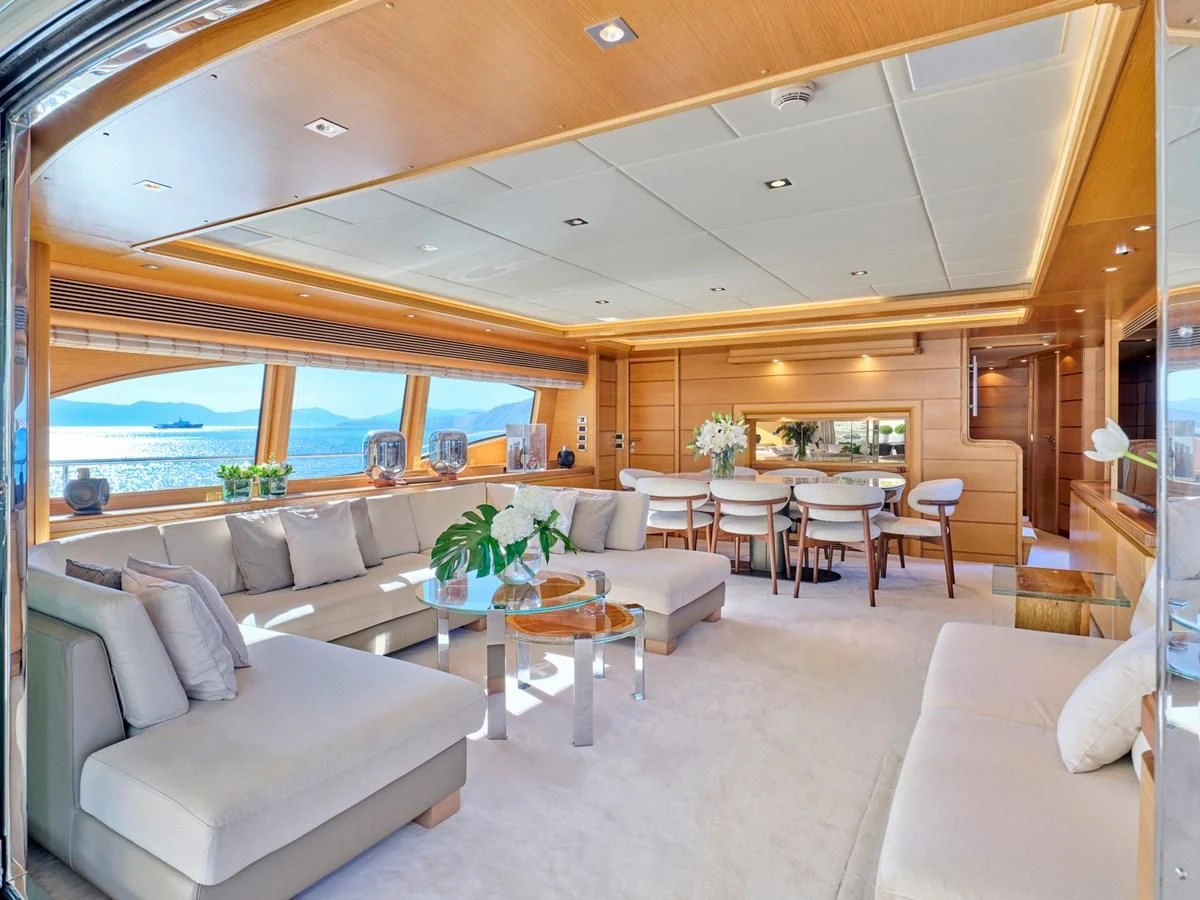 a living room with a large window aboard SEVEN S Yacht for Charter