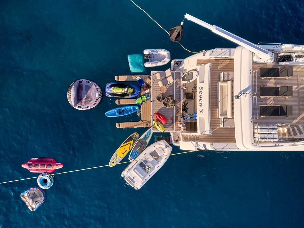 a group of boats on water aboard SEVEN S Yacht for Charter
