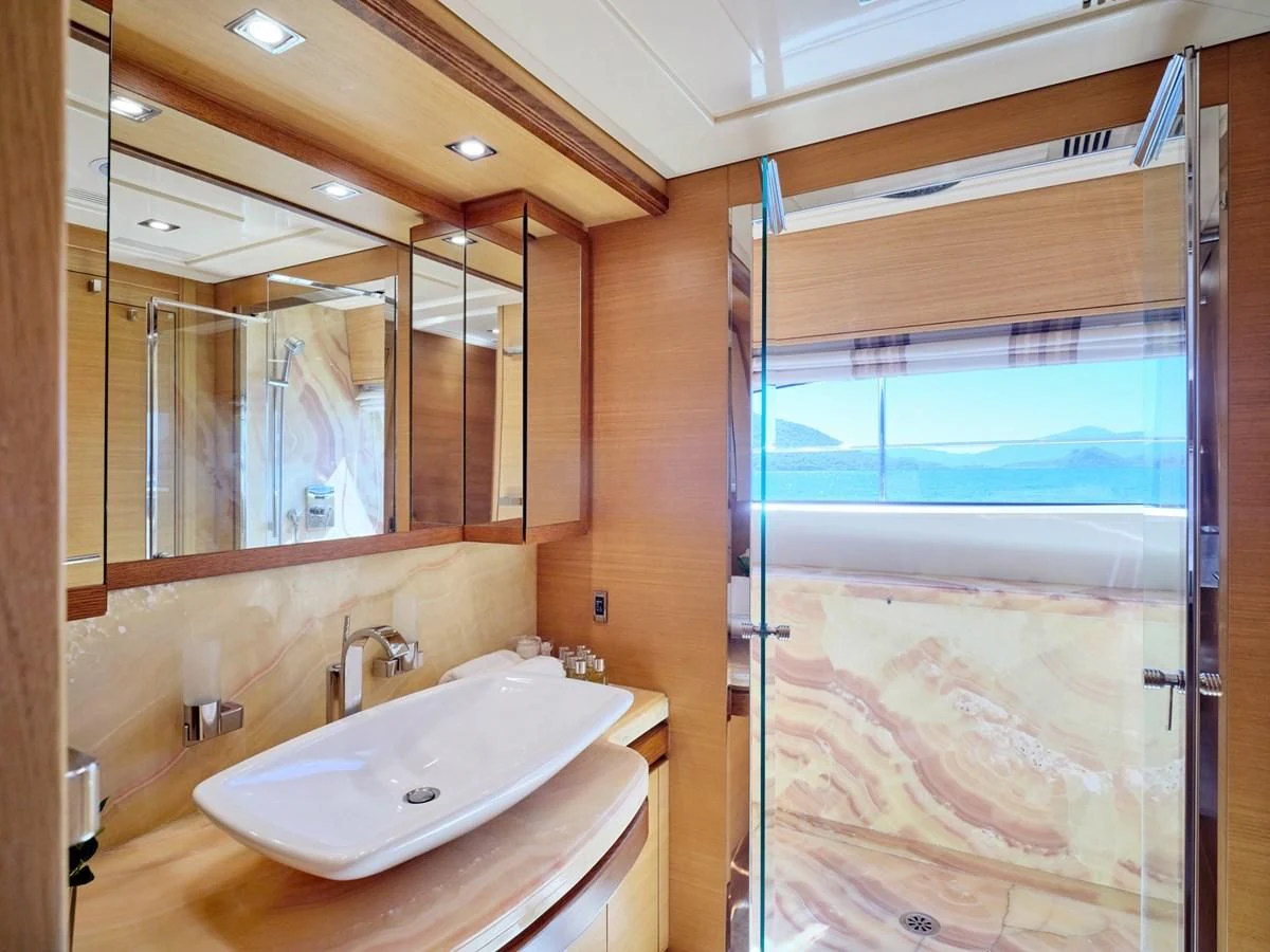 a bathroom with a large mirror aboard SEVEN S Yacht for Charter