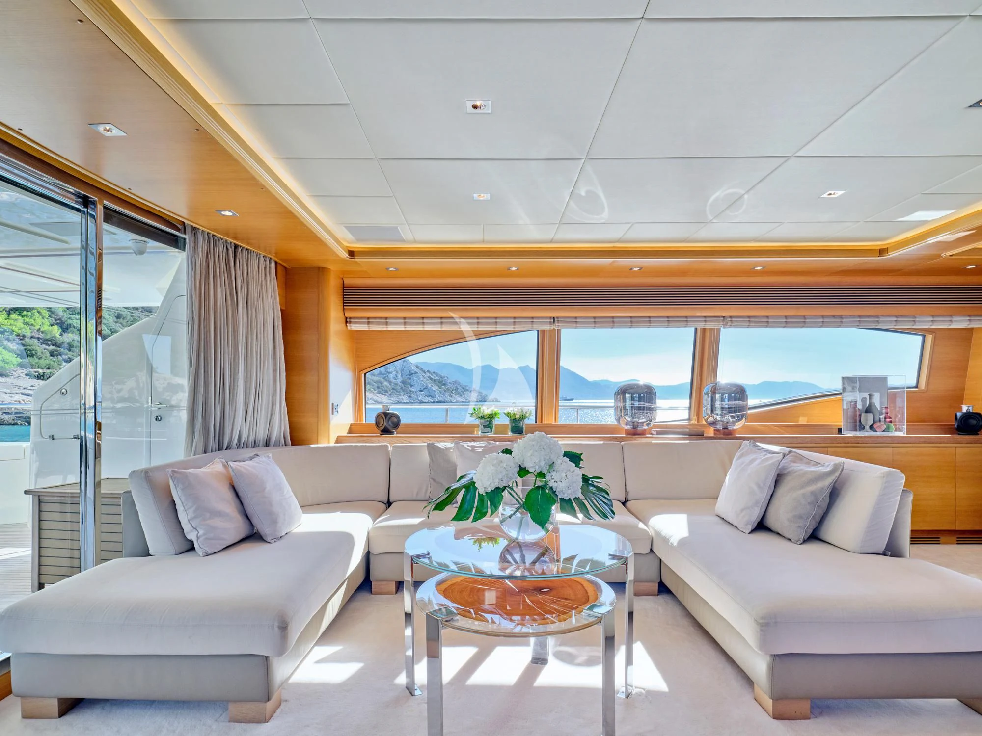 a living room with a couch and a table aboard SEVEN S Yacht for Charter