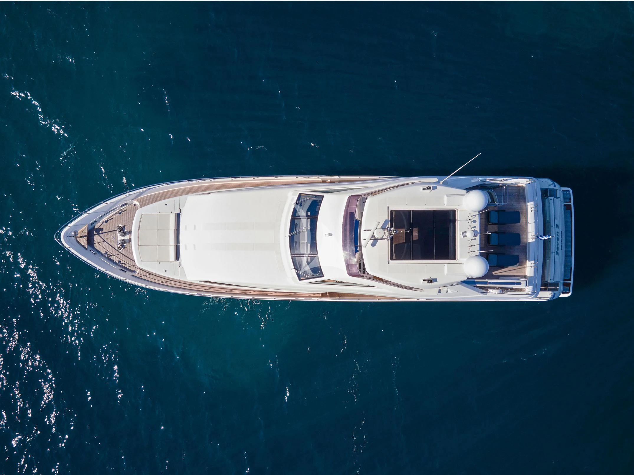 a boat floating in the water aboard SEVEN S Yacht for Charter