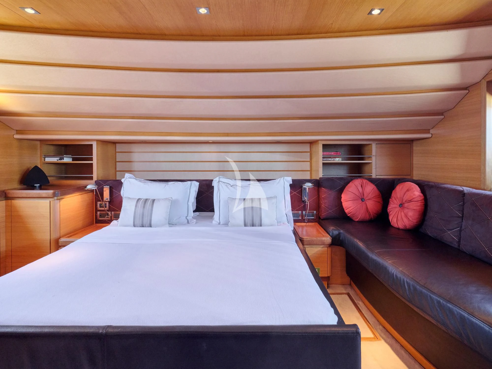 a bed in a room aboard SEVEN S Yacht for Charter