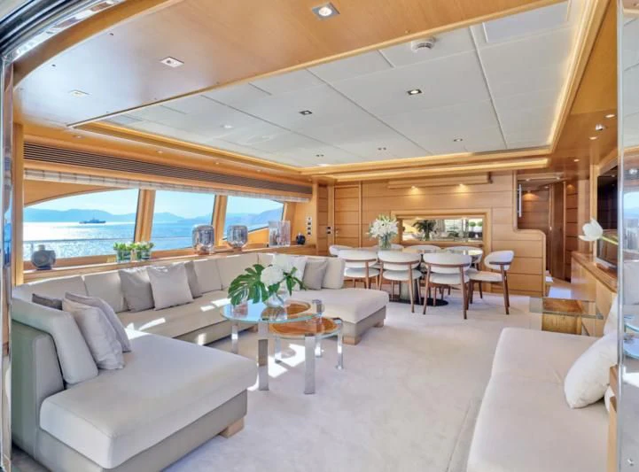 a living room with a large window aboard SEVEN S Yacht for Charter