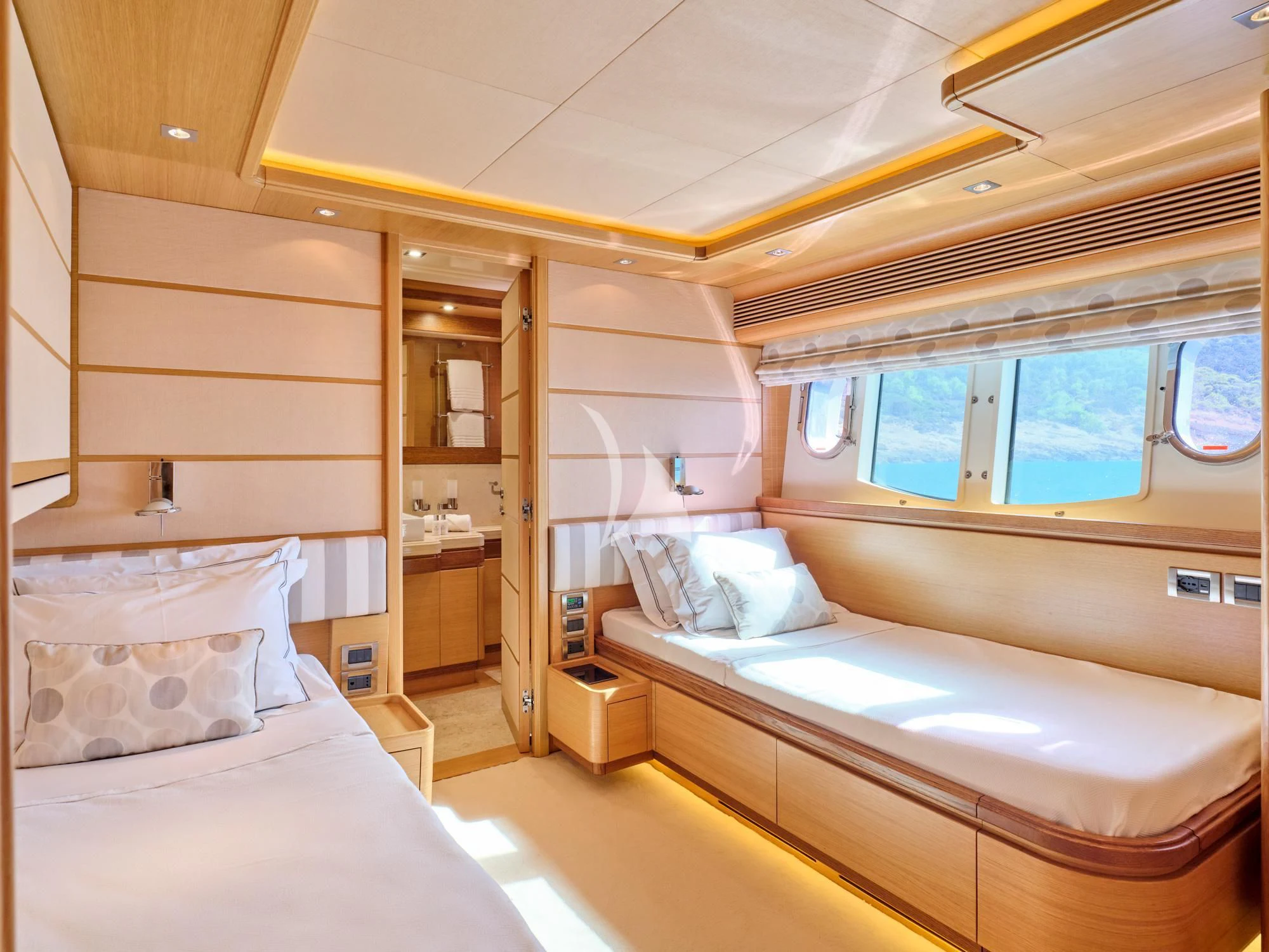 a room with two beds aboard SEVEN S Yacht for Charter