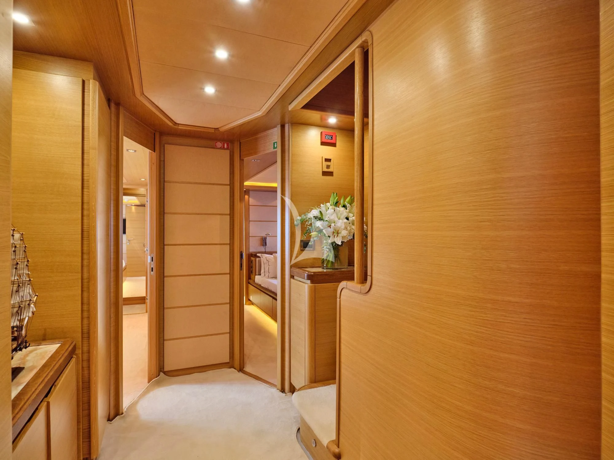 a hallway with a glass door aboard SEVEN S Yacht for Charter
