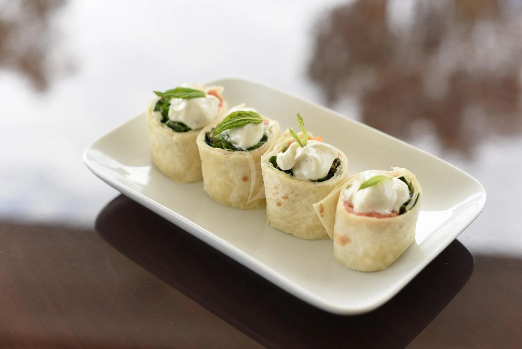 a plate of sushi aboard SEVEN S Yacht for Charter