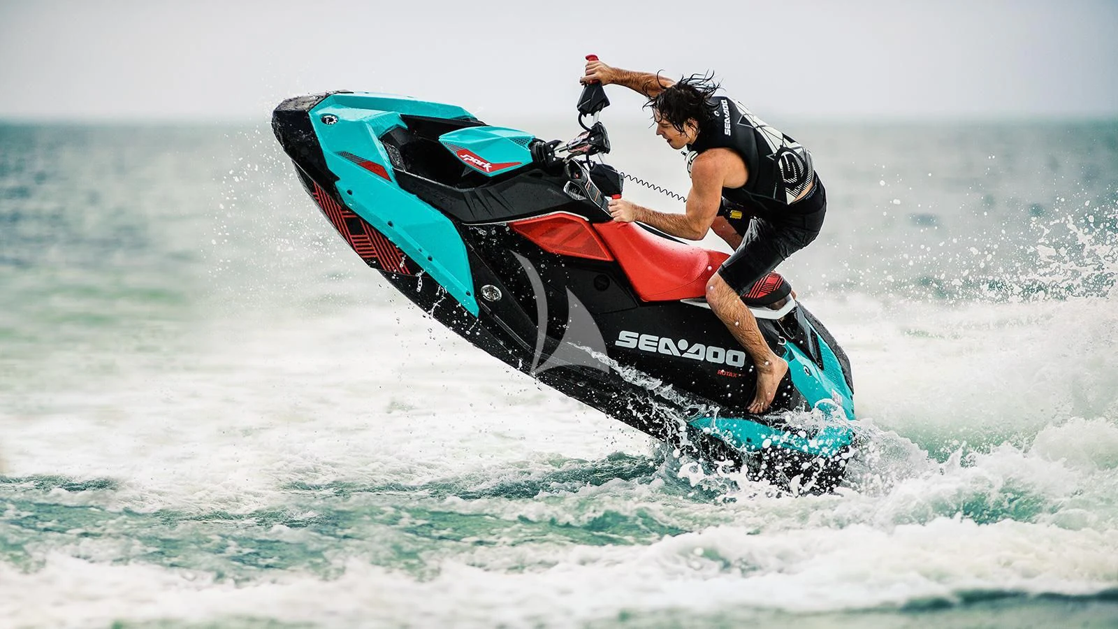 a man riding a surfboard aboard SEVEN S Yacht for Charter