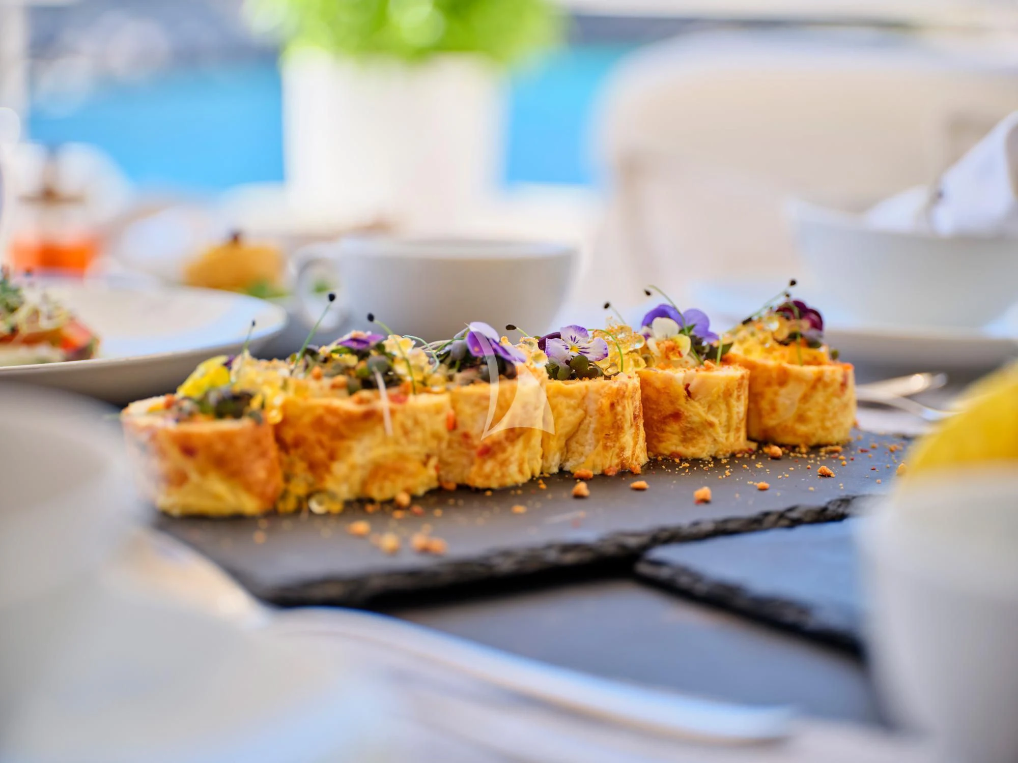 a plate of food aboard SEVEN S Yacht for Charter