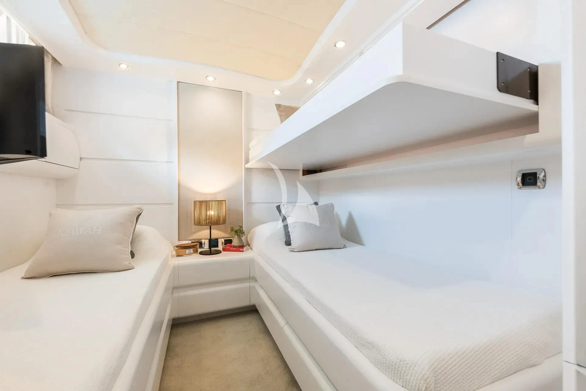 a room with a bed and a television aboard KIAWAH II Yacht for Sale