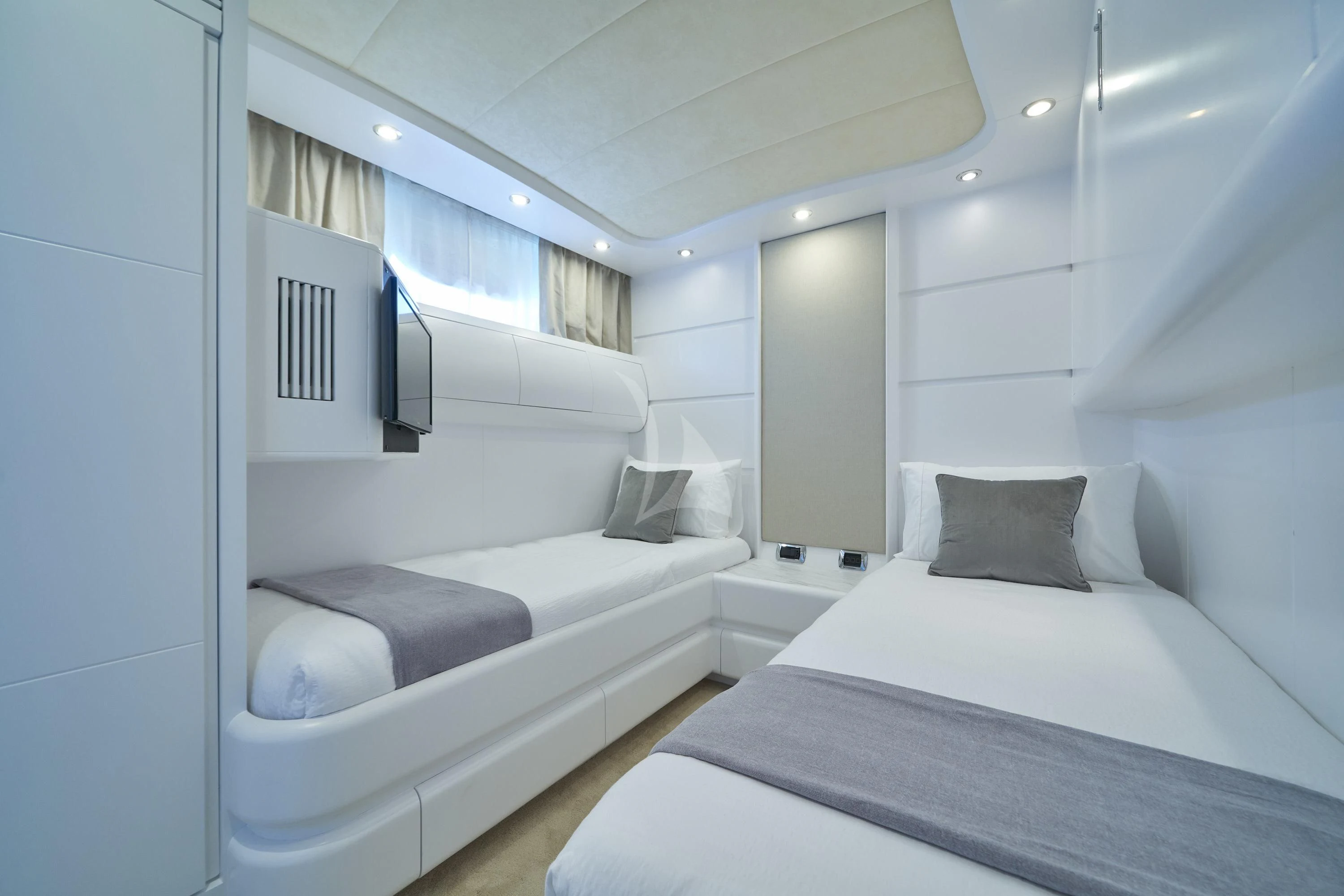 a room with two beds aboard KIAWAH II Yacht for Sale