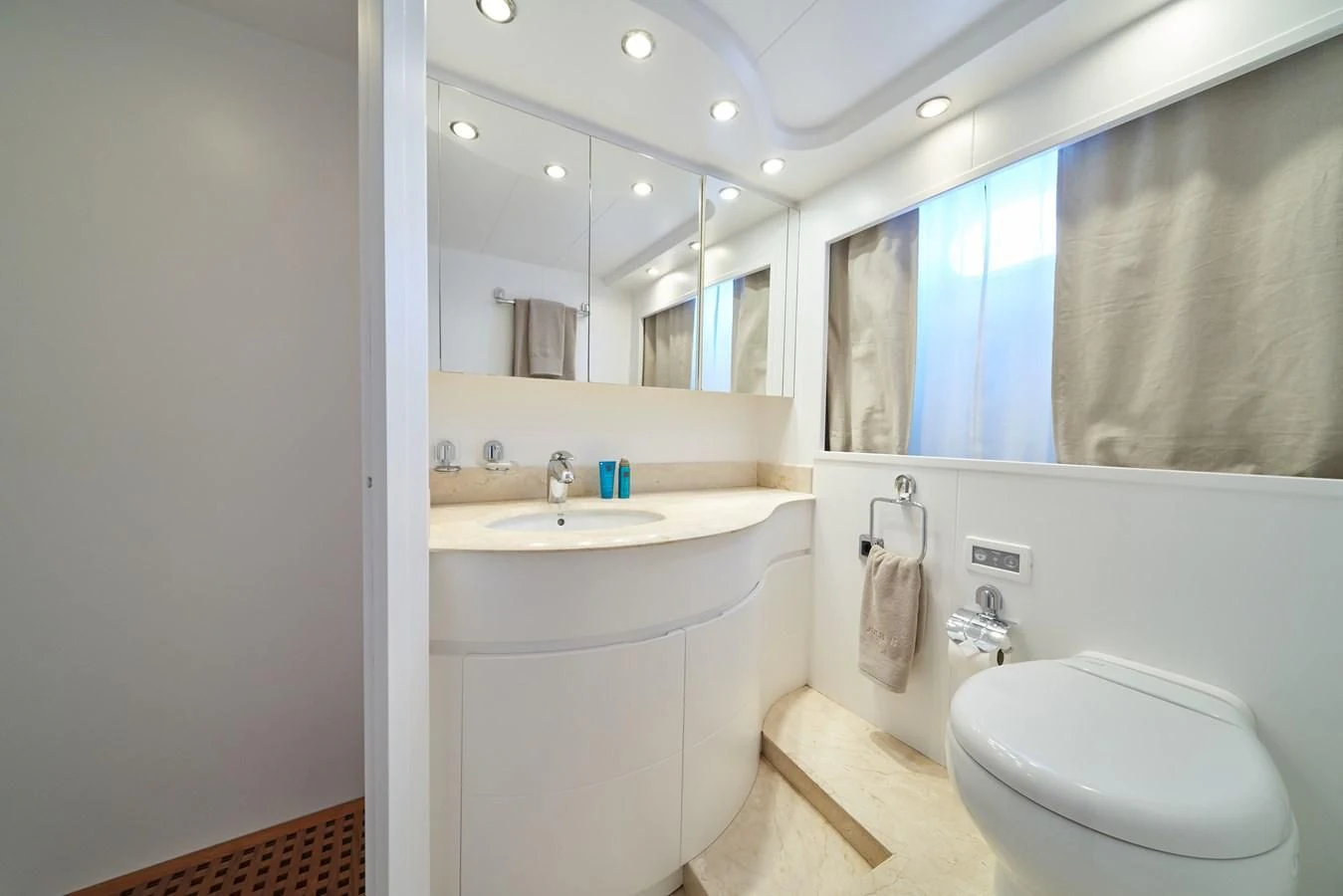 a bathroom with a sink and a toilet aboard KIAWAH II Yacht for Sale