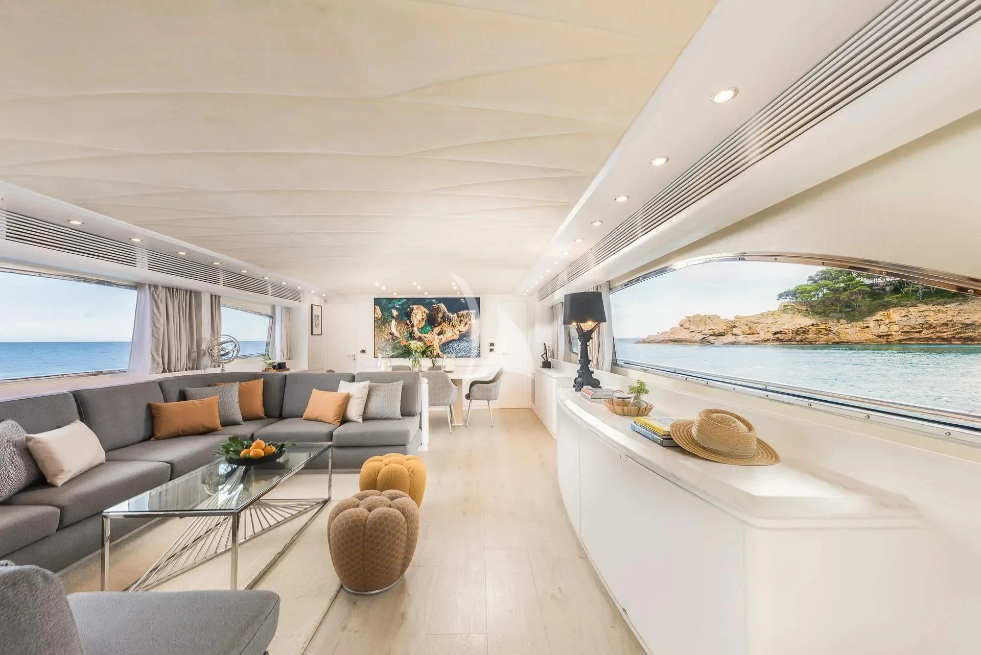 a living room with a large swimming pool aboard KIAWAH II Yacht for Sale