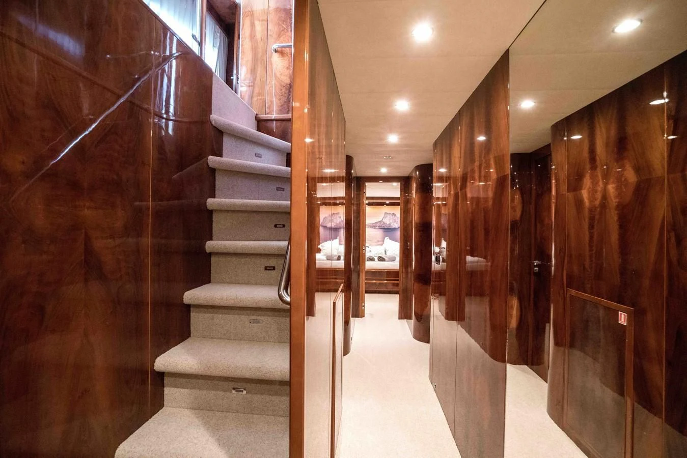 a hallway with wood walls aboard KIAWAH II Yacht for Sale