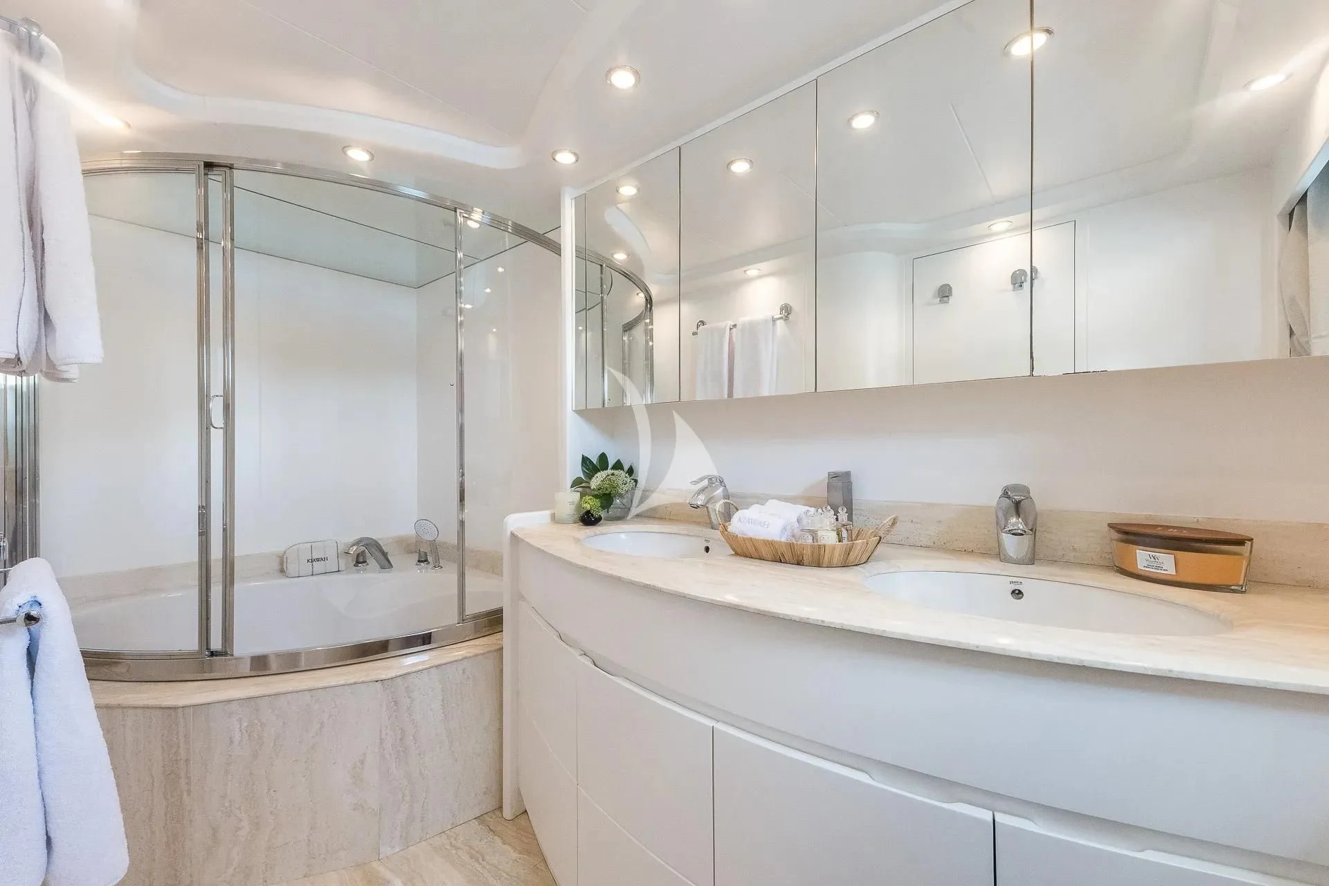 a bathroom with a large shower aboard KIAWAH II Yacht for Sale