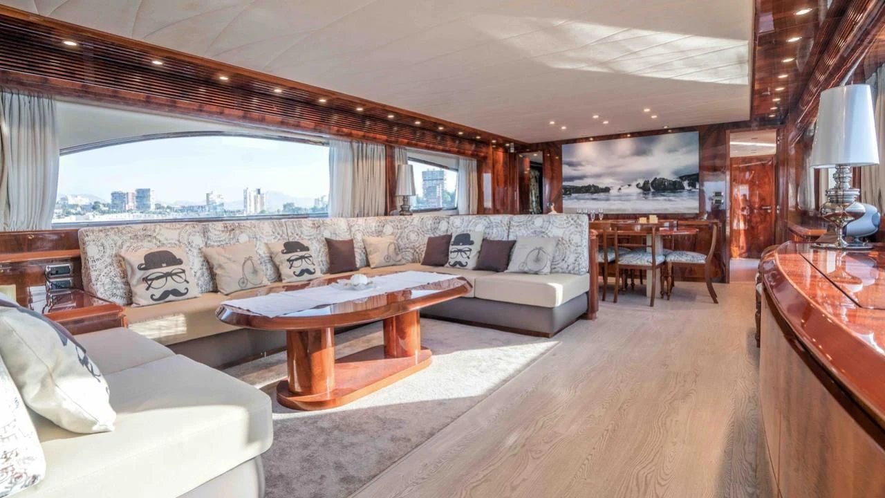 a living room with a large window aboard KIAWAH II Yacht for Sale