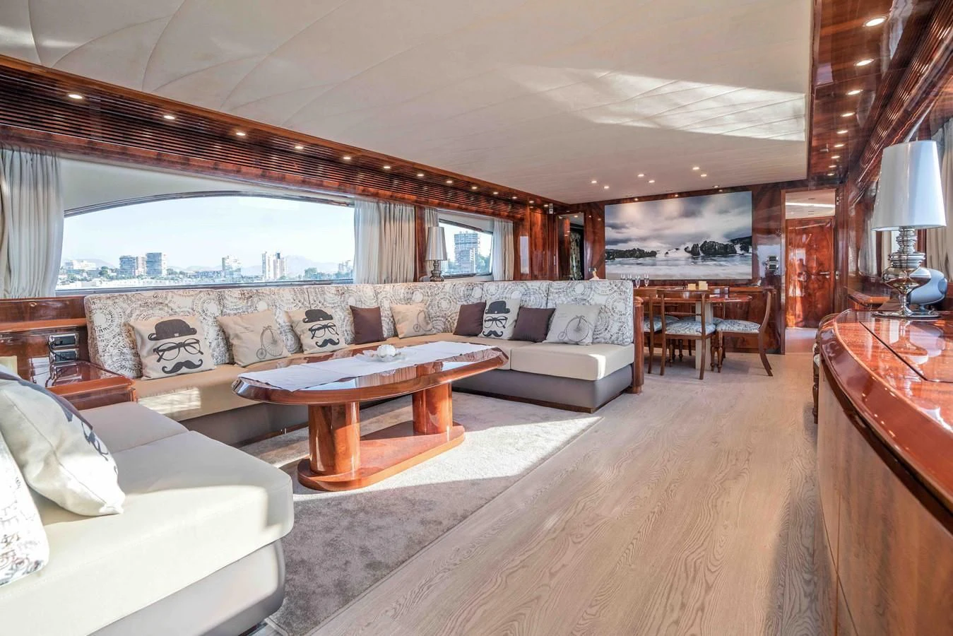 a living room with a large window aboard KIAWAH II Yacht for Sale