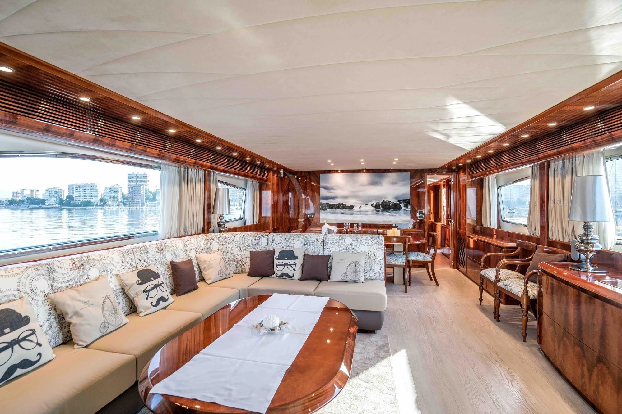a large bedroom with a large bed aboard KIAWAH II Yacht for Sale