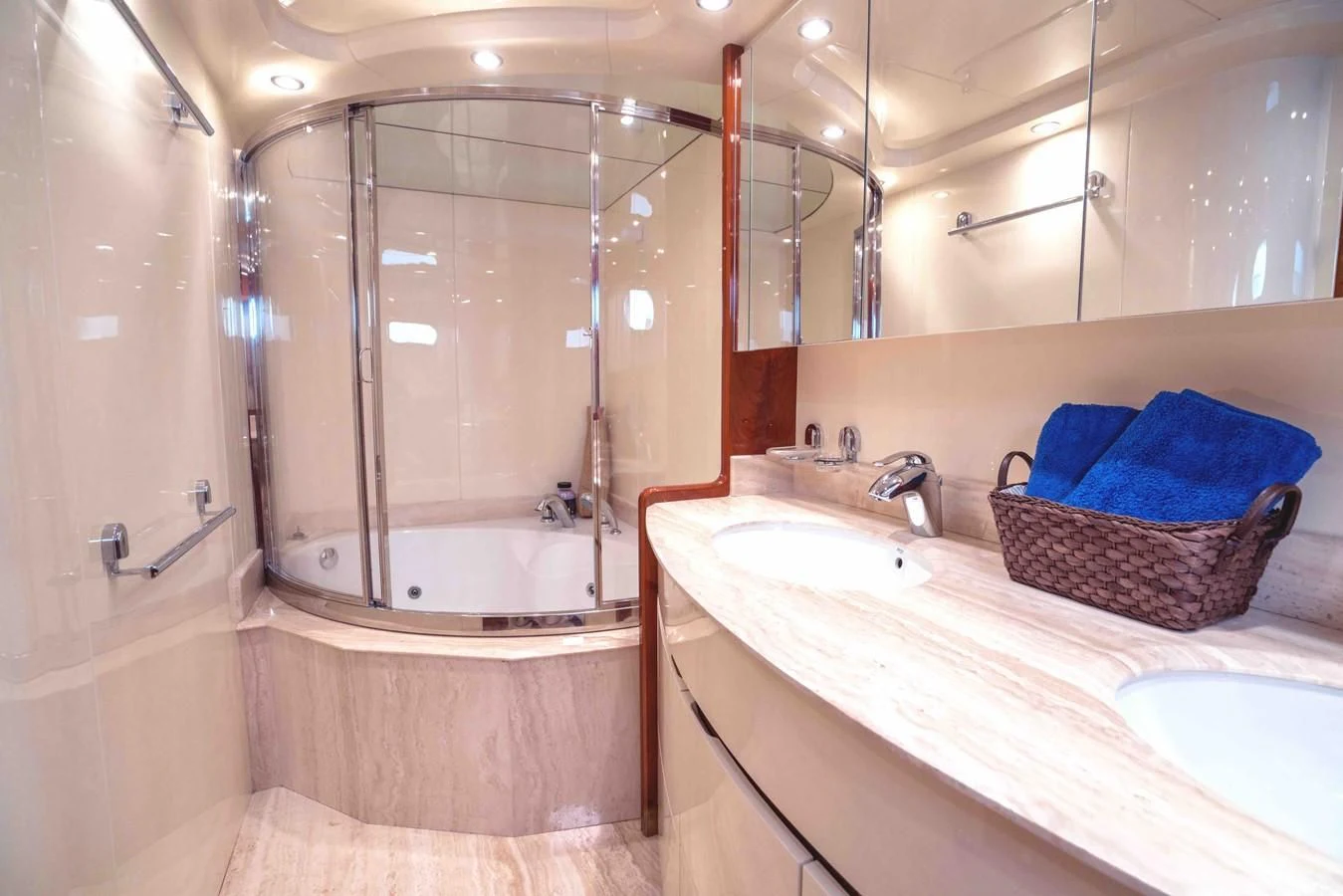 a bathroom with a tub sink and a shower aboard KIAWAH II Yacht for Sale