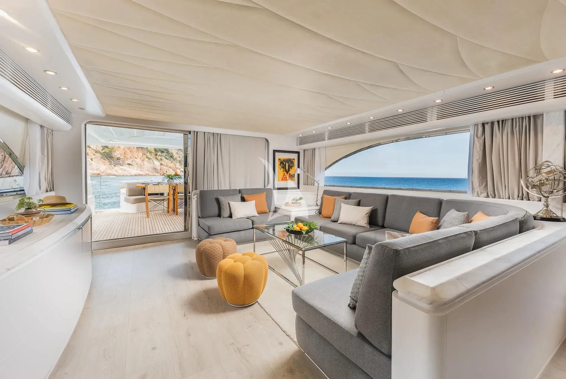 a living room with a large window aboard KIAWAH II Yacht for Sale