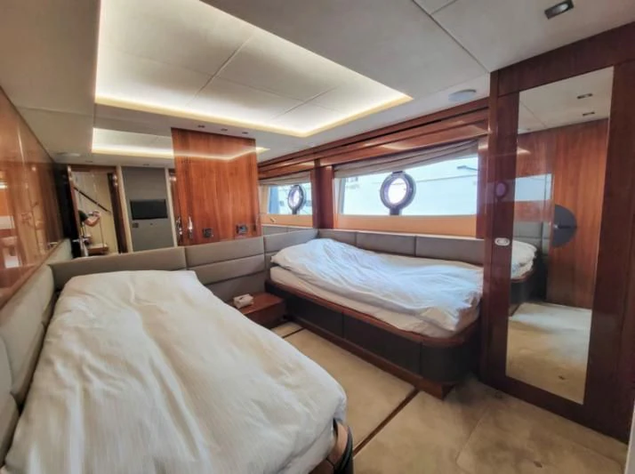 a room with two beds aboard MY LILY Yacht for Sale