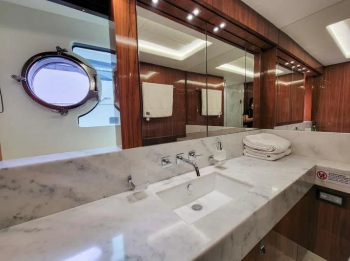 a bathroom with sinks and mirrors aboard MY LILY Yacht for Sale