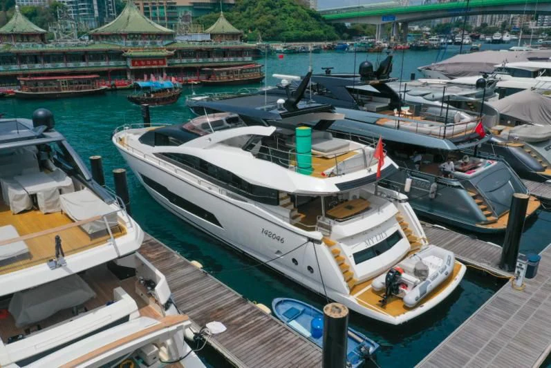 boats docked at a pier aboard MY LILY Yacht for Sale