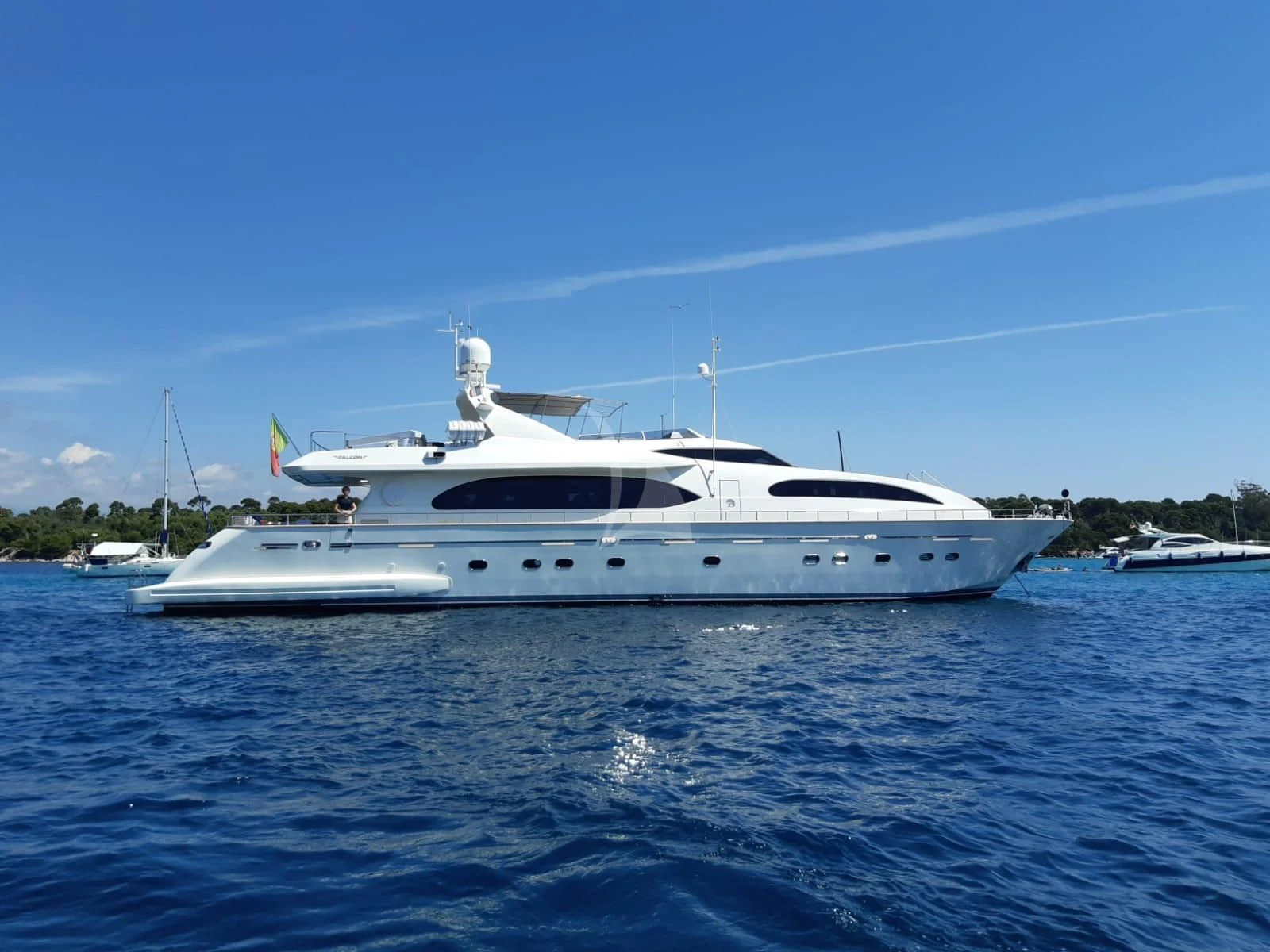 a white yacht in the water aboard YLANG YLANG Yacht for Sale