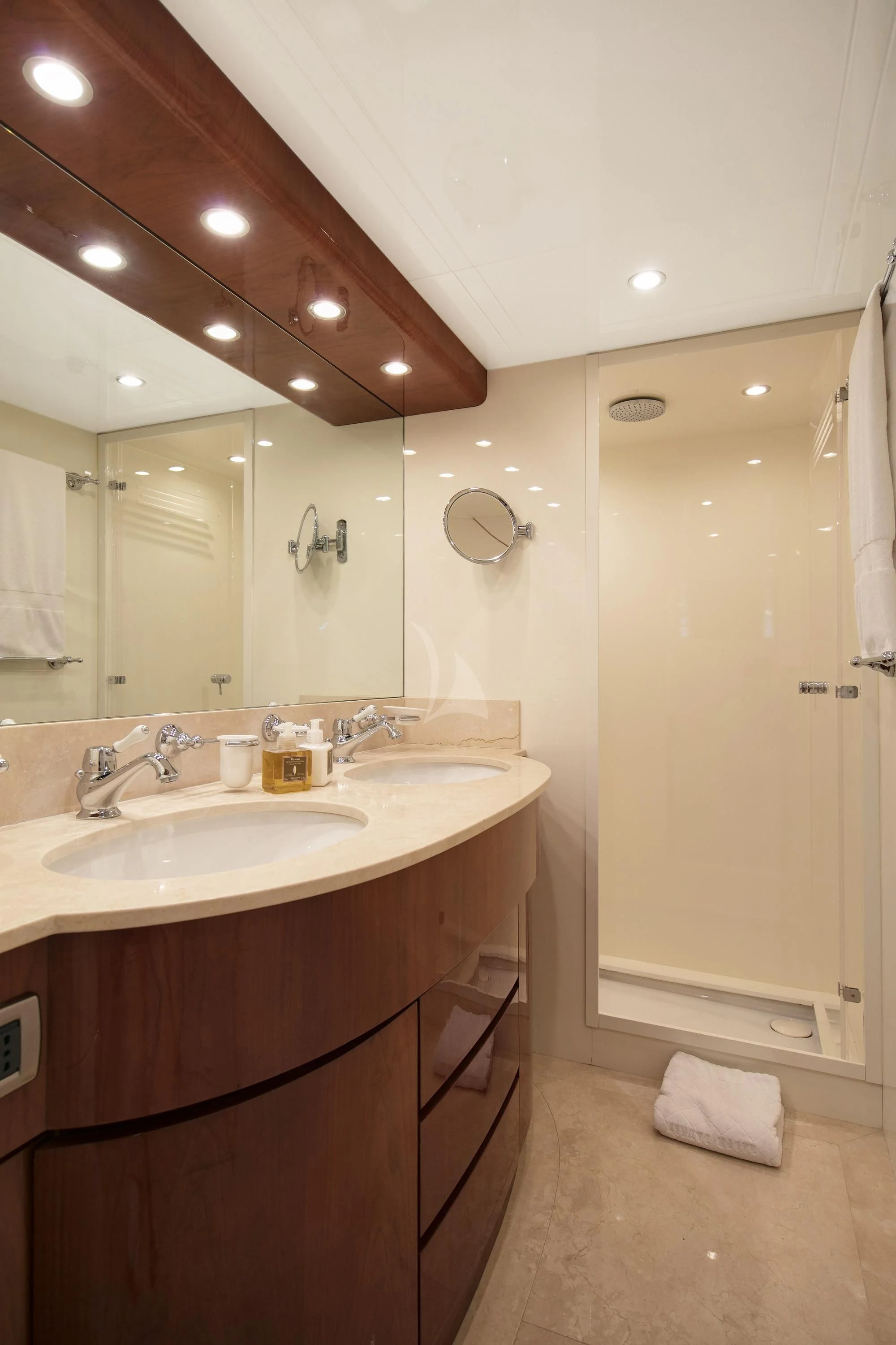 a bathroom with a large mirror aboard YLANG YLANG Yacht for Sale