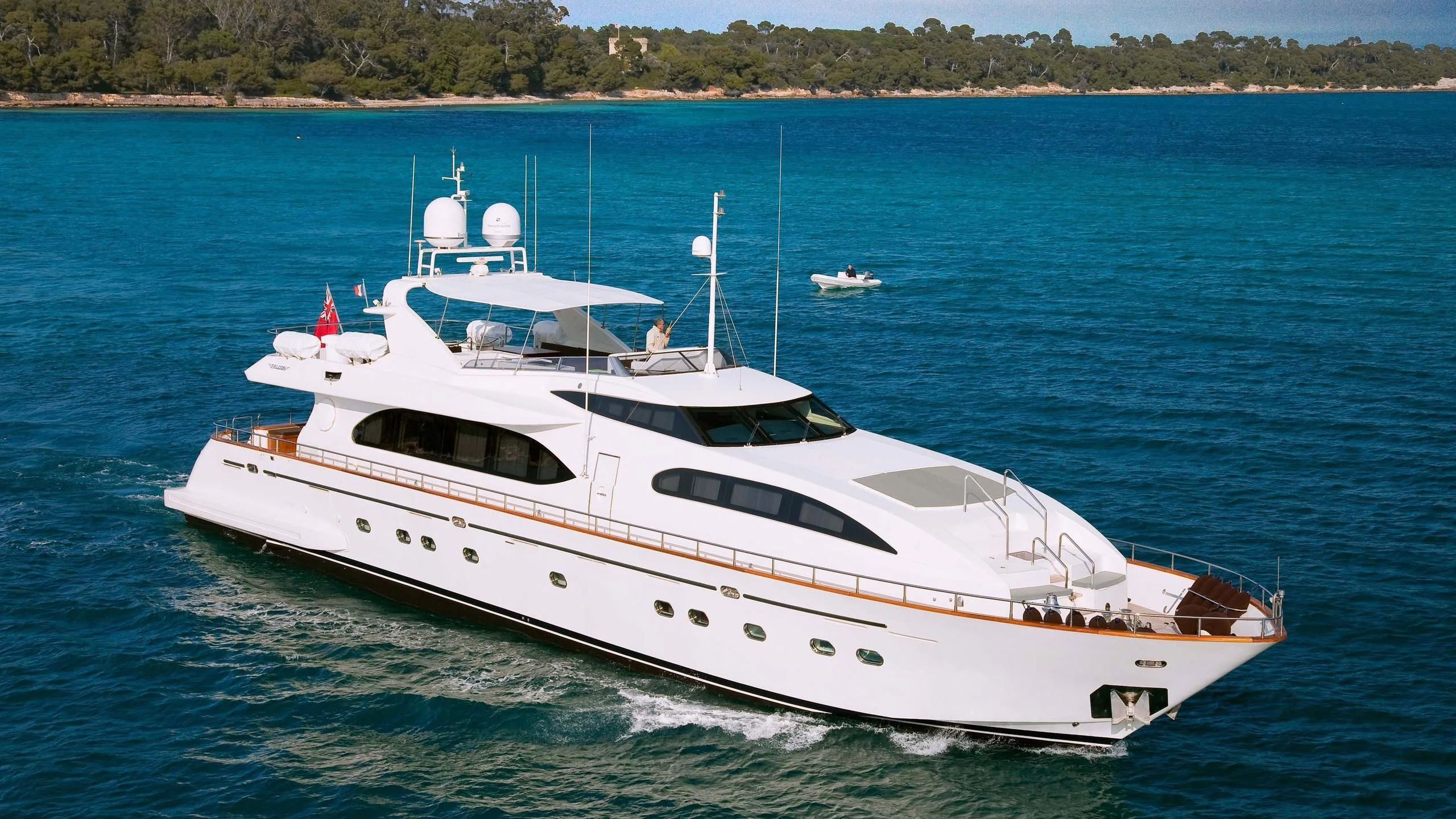 a white yacht on the water aboard YLANG YLANG Yacht for Sale
