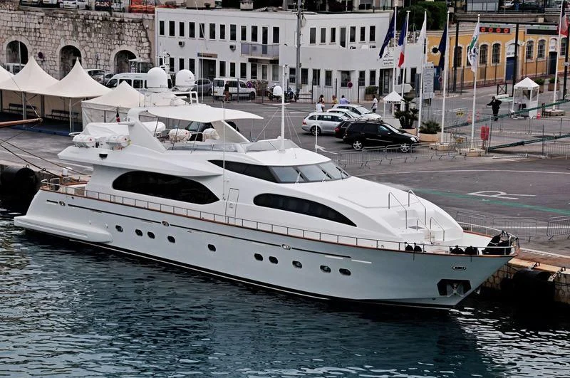a yacht in the water aboard YLANG YLANG Yacht for Sale