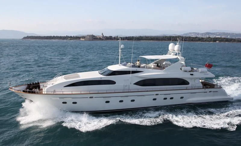 a white yacht on the water aboard YLANG YLANG Yacht for Sale