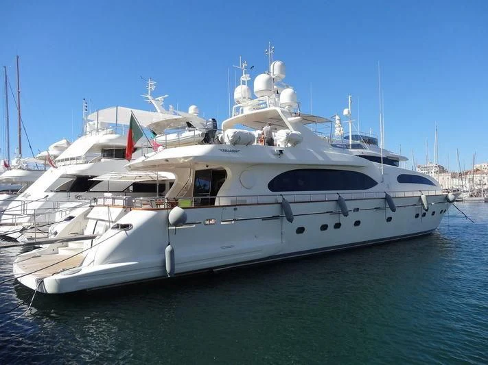 a white yacht on the water aboard YLANG YLANG Yacht for Sale