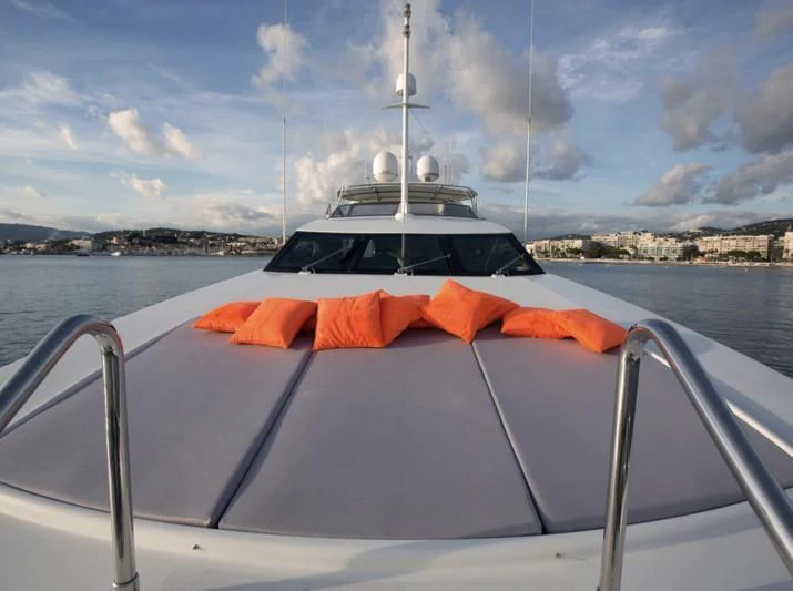 a boat on a body of water aboard YLANG YLANG Yacht for Sale