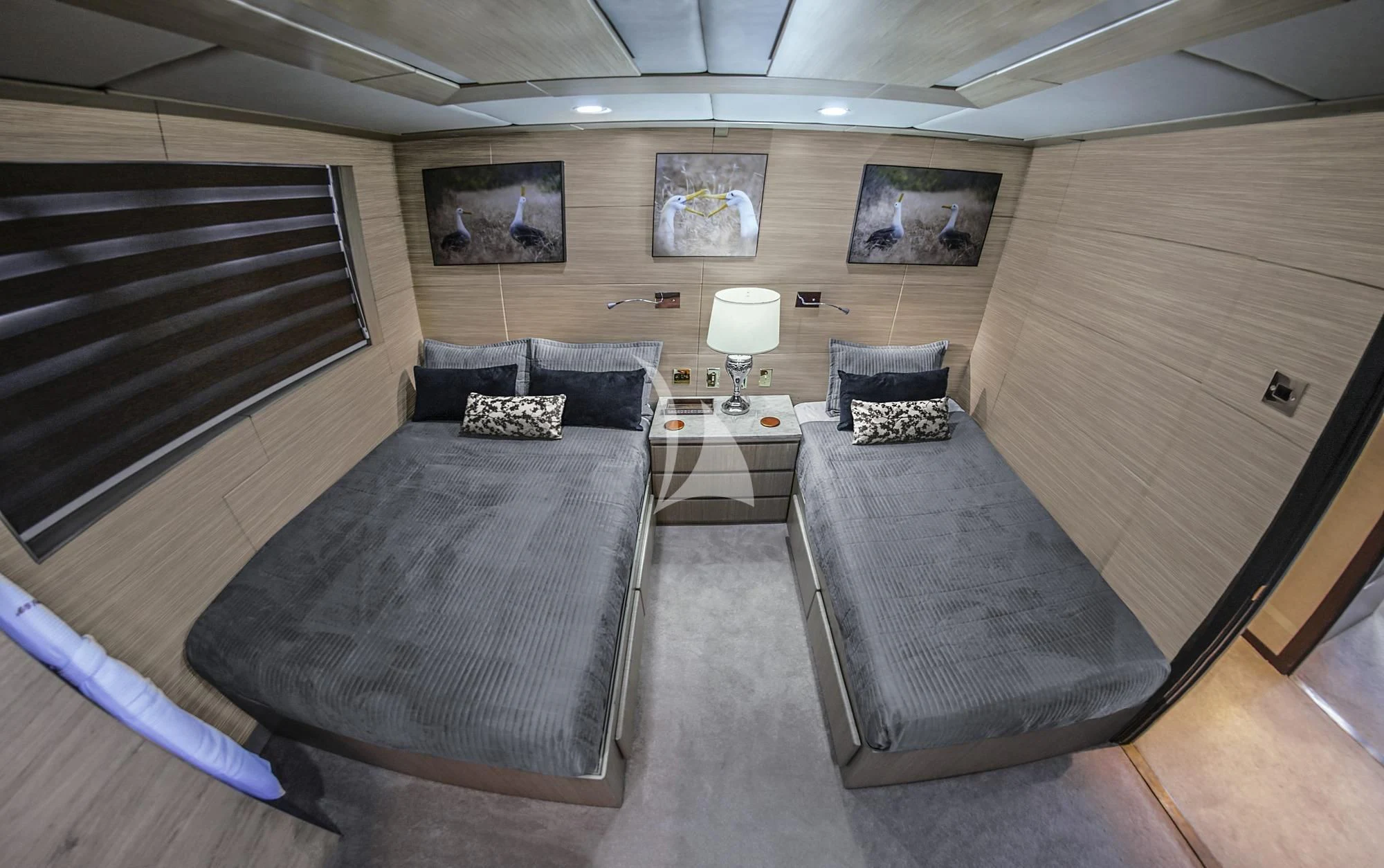a room with a couch and a table aboard M/Y PASSION Yacht for Sale