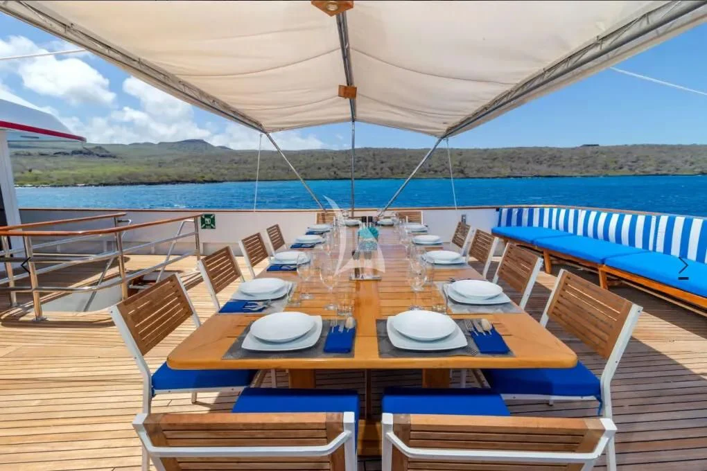 a table set for a meal on a boat aboard M/Y PASSION Yacht for Sale