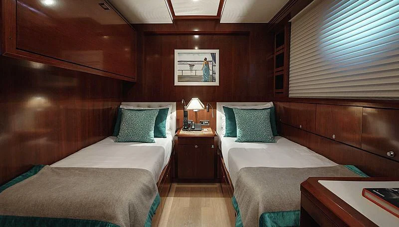 a room with two beds aboard W EXPLORER Yacht for Sale