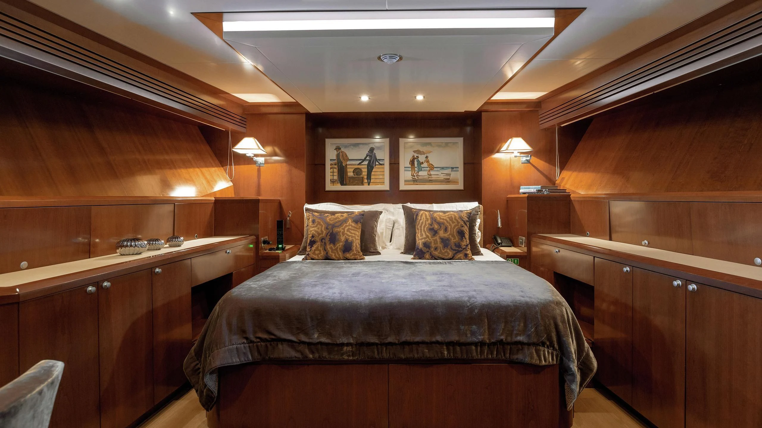 a bed in a room aboard W EXPLORER Yacht for Sale