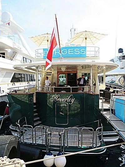 a boat with flags on it aboard W EXPLORER Yacht for Sale