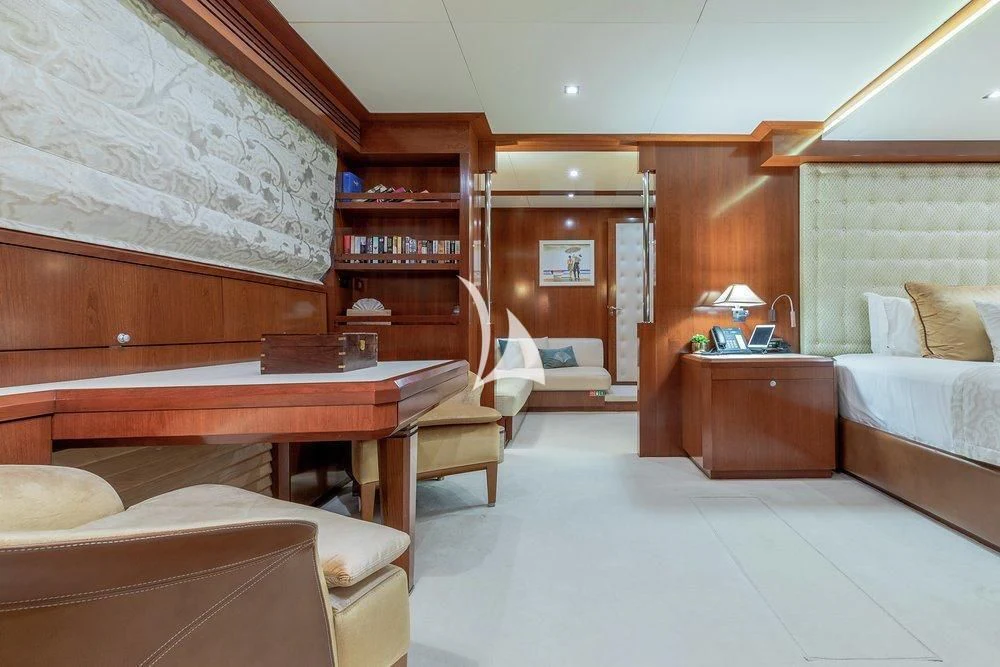 a room with a desk and a bed aboard W EXPLORER Yacht for Sale